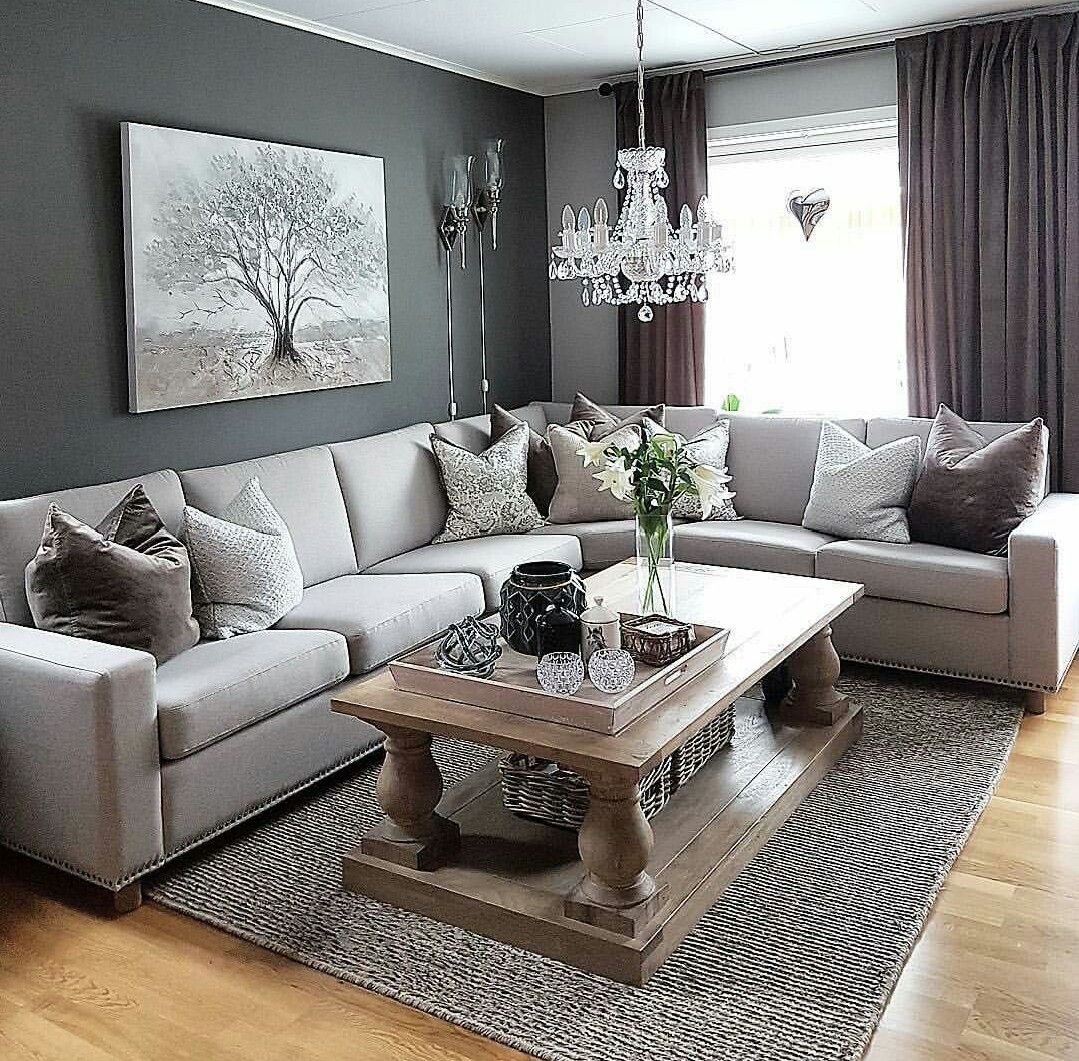 Зал серый диван. Декор в серую гостиную. Красивый серый диван. Серый диван декор гостинной. Гостиная с серым диваном.