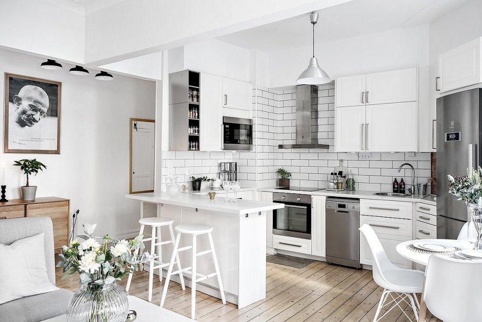 Дизайн кухни гостиной в белых тонах
