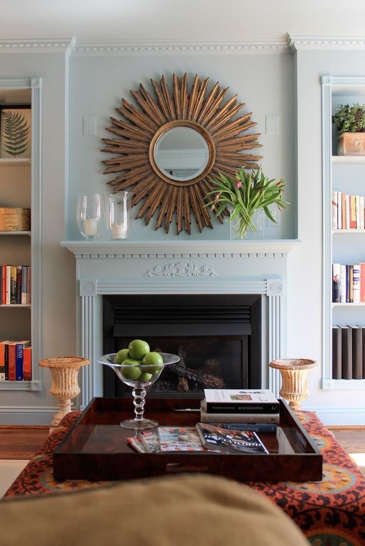 Декор над камином в интерьере