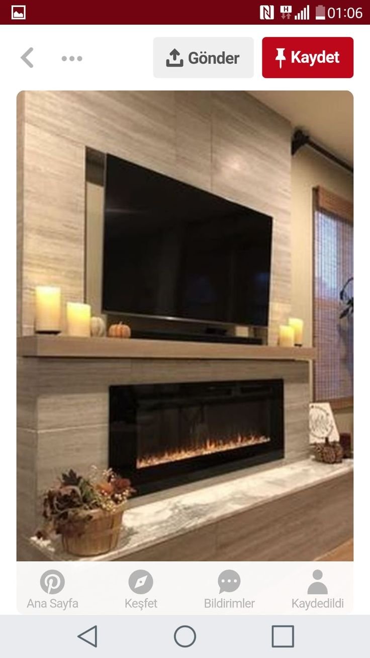 Искусственный камин в гостиной под телевизор