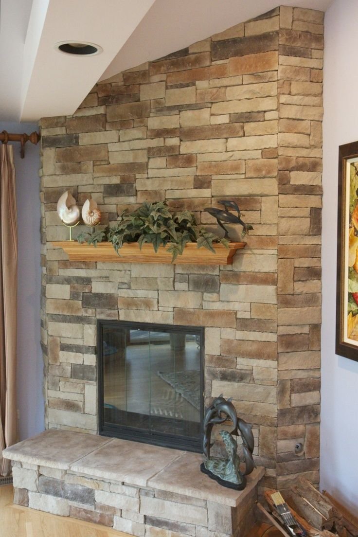 Отделать камин искусственным камнем