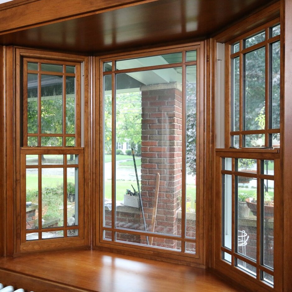 Пластиковые окна с ламинацией под дерево
