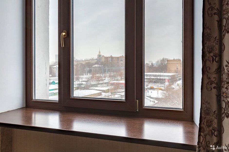 Коричневые пластиковые окна Рехау