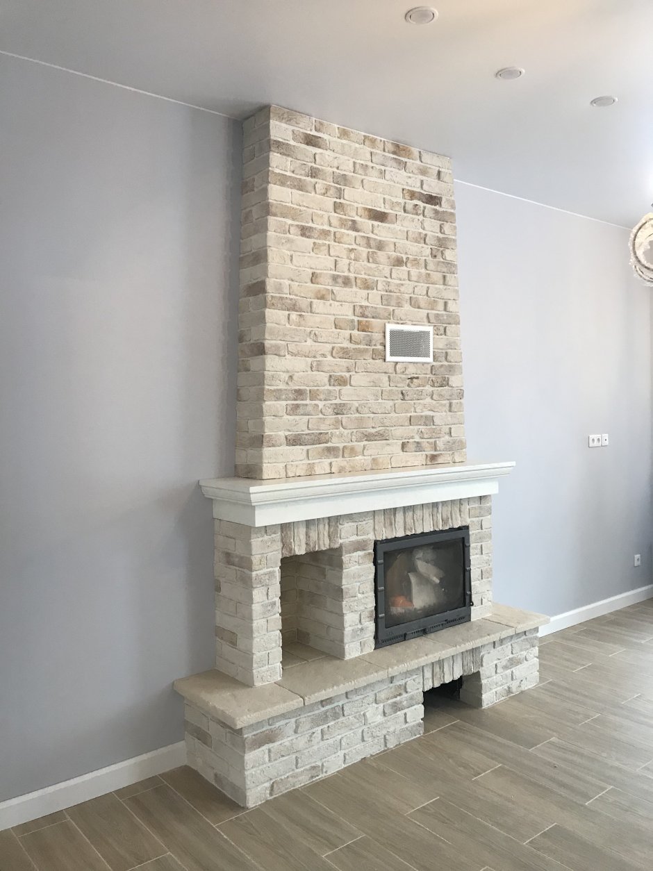 Облицовка камина декоративным камнем