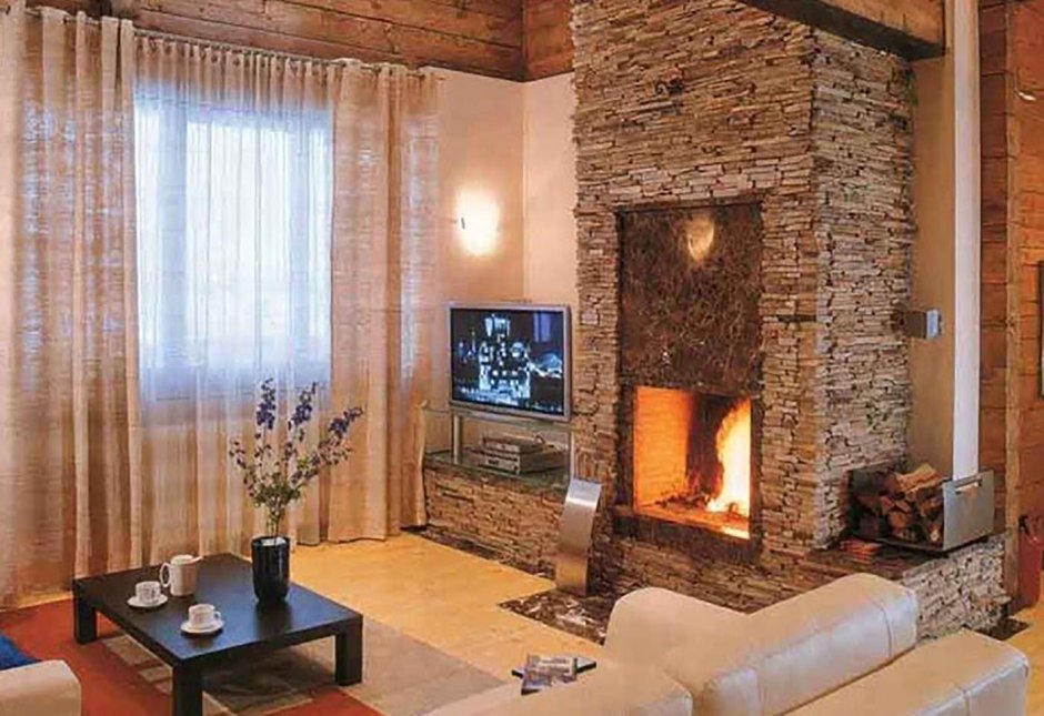 Отделка камина искусственным камнем