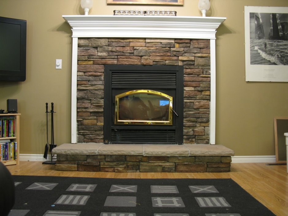 Облицовка камина искусственным камнем