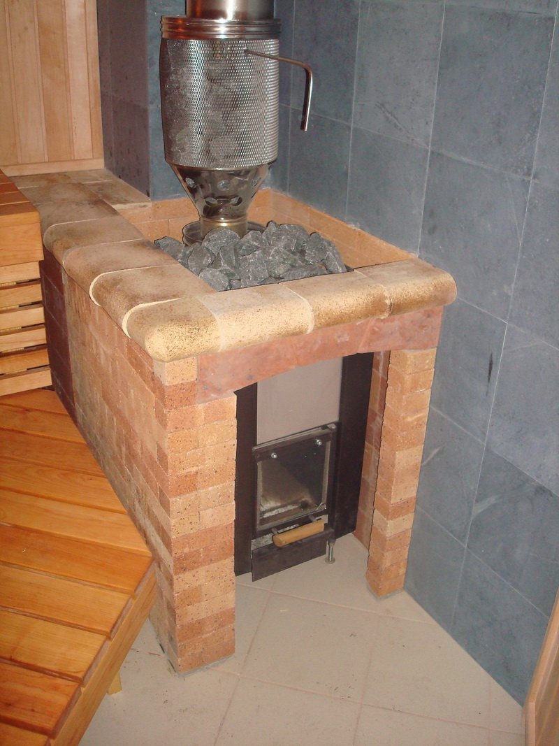 Печь буржуйка обложенная кирпичом