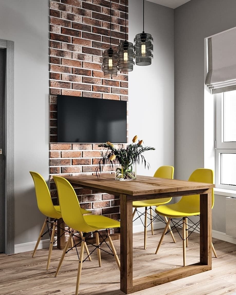 Стол у стены на кухне в интерьере