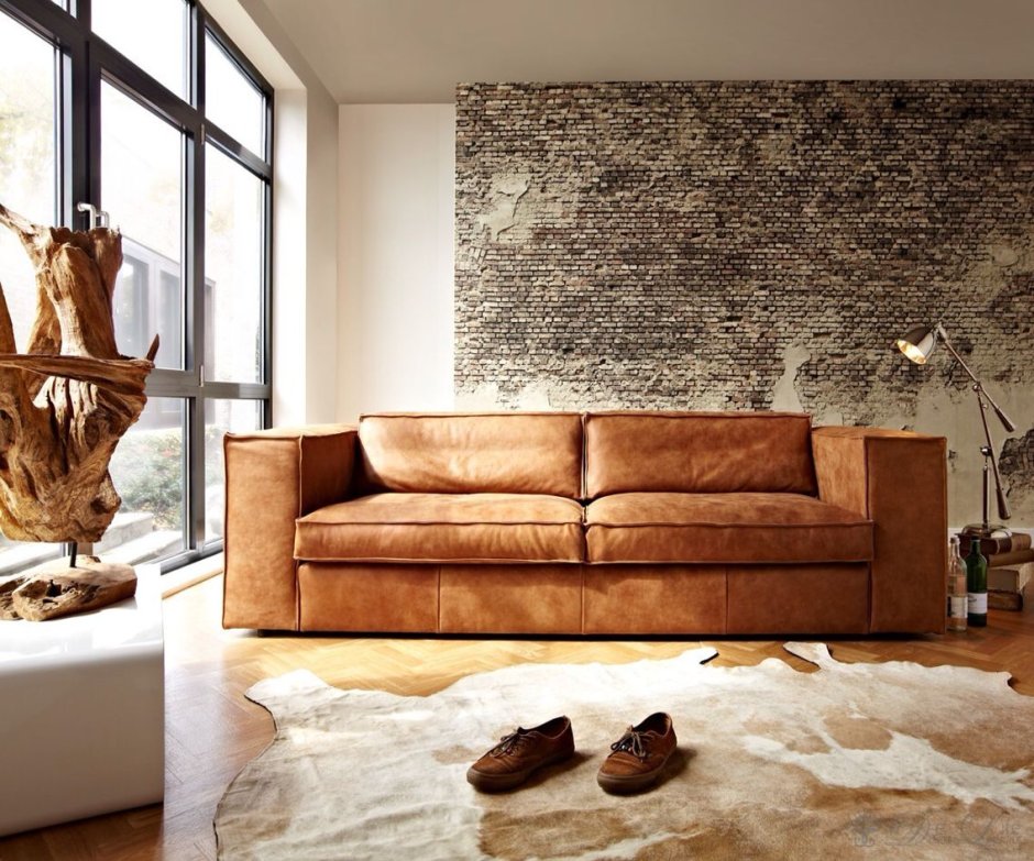 Кожаный диван в интерьере лофт