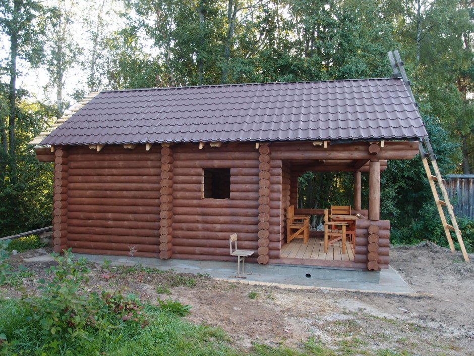 Баня 6х3 с террасой из оцилиндрованного бревна