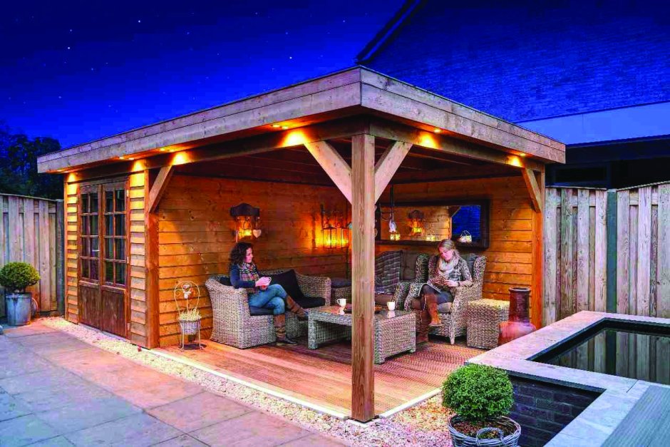 Баня с односкатной крышей и террасой и зоной барбекю