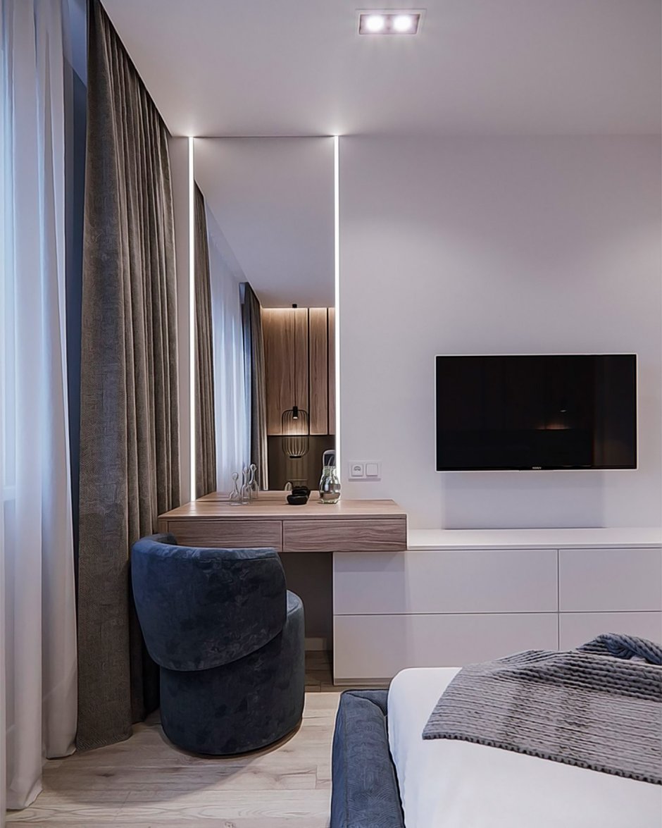 Телевизор на стене в спальне