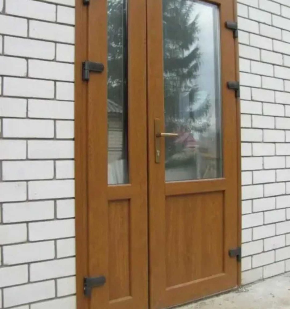 Двери входные пластиковые со стеклом профиль 70мм