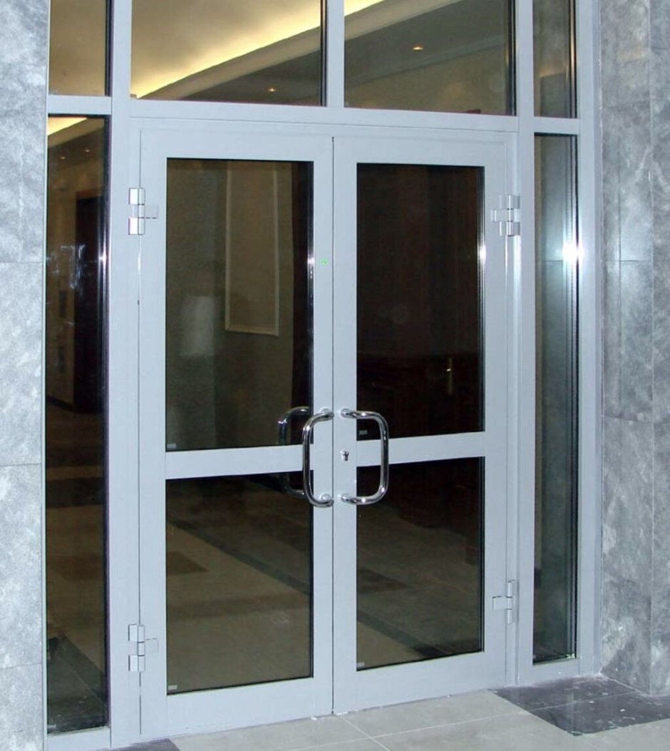 Дверной блок алюминиевый остекленный двупольный