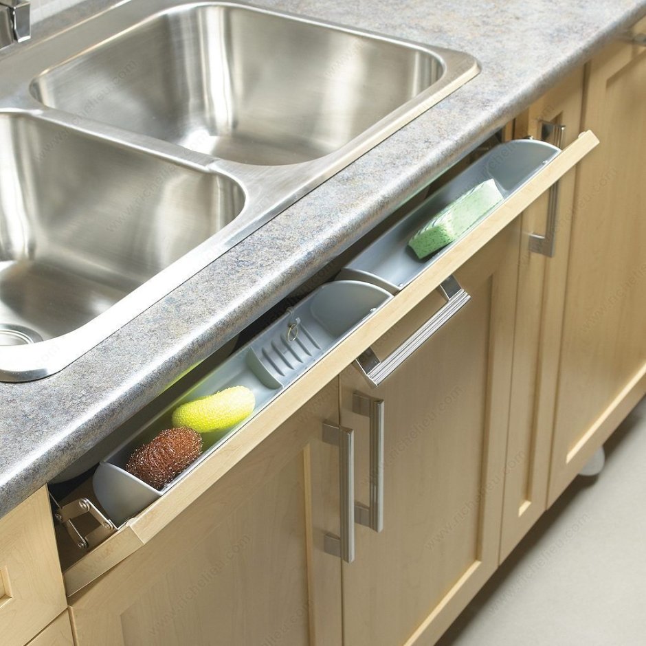 Выдвижные ящики под раковиной на кухне